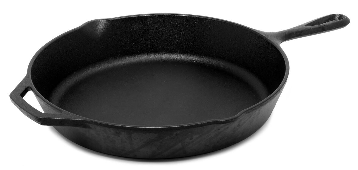 A clean, empty cast iron skillet with an even dark surface